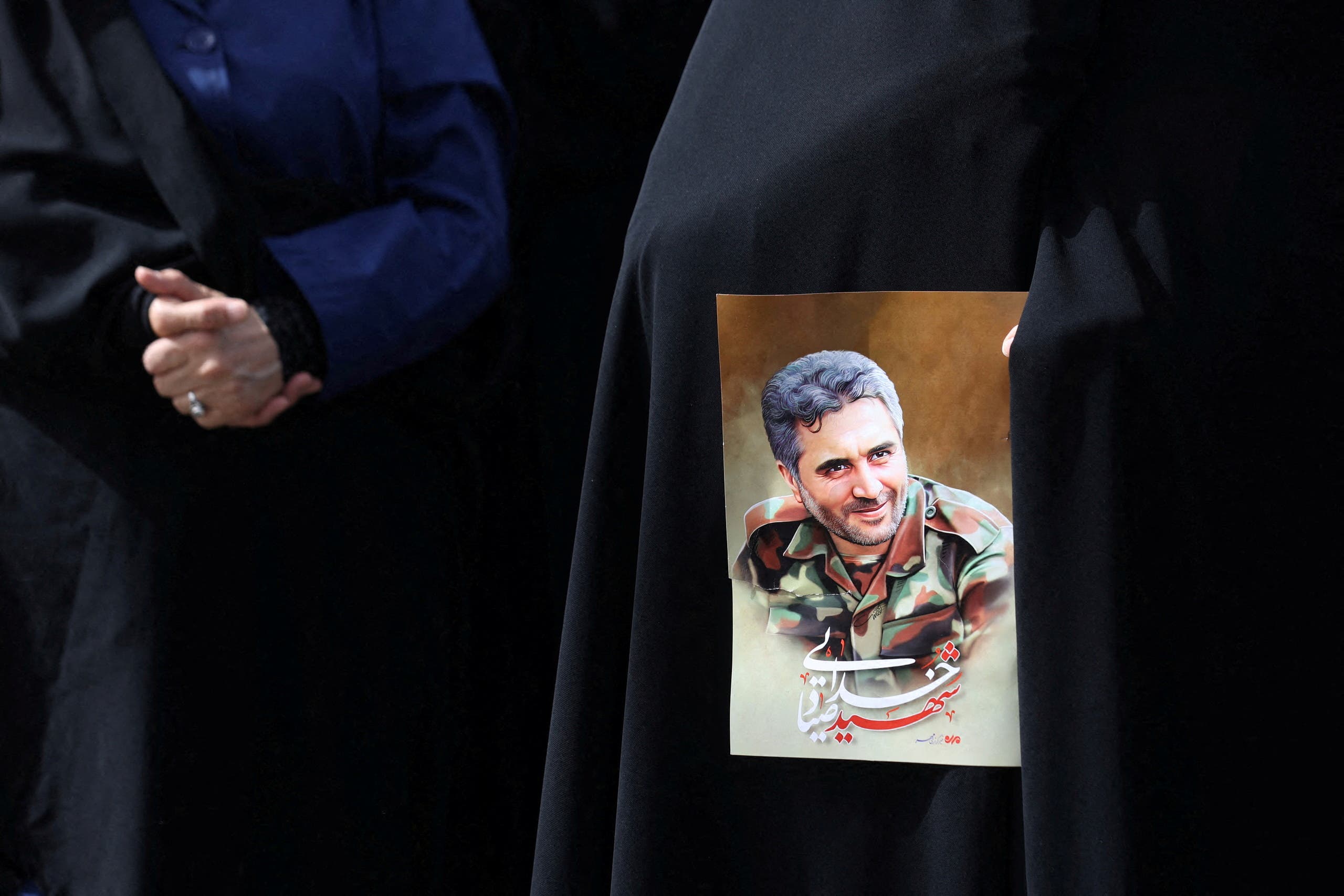 صورة عقيد الحرس الثوري الذي اغتيل في طهران صياد خدائي في العاصمة الإيرانية - رويترز